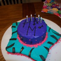 Hannah Montana Made this for a friend's 5 year old. She loves Hannah Montana. First attempt with gum paste for the zebra stripes. Used ideas from...