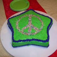 Peace Sign Birthday Cake My daughter's 10th birthday. She requested green, purple, and a peace sign. The girls at the slumber party loved it and devoured the...