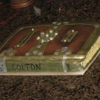 Birthday Book Book cake- Iced with chocolate buttercream, textured with crumpled plastic wrap, and airbrushed to give depth. The binding and other...