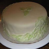 Experimental- Cream Cheese Fondant My first attempt at CC fondant. It tastes great, but is hard to work with. I painted a little pearl dust on the leaves for a bit of color....