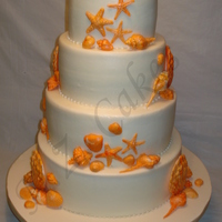 Seashells Wedding Cake The bride's colors were tones of orange, so she wanted all the seashells in those tones. My FIRST official wedding cake, I've...