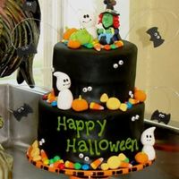 Halloween Black fondant covered cake, ghosts, frog, pumpkins, bats all made of fondant