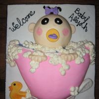 Baby Girl In Bath Tub Baby Shower Cake This was made for my son's preschool teacher. It is a baby girl in a bathtub with plenty of bubbles, a ducky and a bar of soap! Fun...