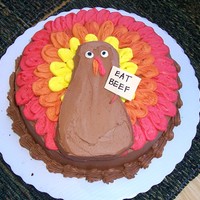 "eat Beef" Turkey Cake I got this idea from this website. Thank you! It's just a simple round cake with buttercream frosting. I used a separate piece of cake...
