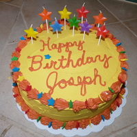 Star Birthday Cake Just a simple cake with little stars and star candles.