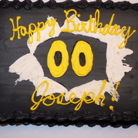 Glow-In-The-Dark Party Cake The cake doesn't glow, but it matched the invitations and t-shirts we made. It's supposed to look like 2 eyes bursting through...