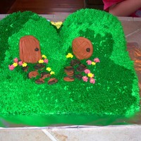Hobbit Hole Cake I made this cake for my son when he starred in "The Hobbit" as Bilbo Baggins. The doors and stepping stones are fondant. The...