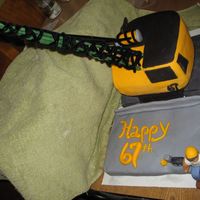 Construction Crane Cake This is the cake I just did for my Fathers 67th Birthday. He is a retired Iron Worker. Both the bridge and the crane are fondant covered...