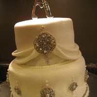 Rhinestones And Bows Pink Champagne Cake, white fondant, rhinestone, pearl, and bow accents