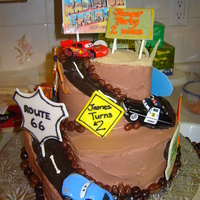 Cars Made this for my friend's son's 2nd who was devastated when he saw me taking some of his Cars for the cake. 10" & 6"...
