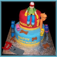Handy Manny Marble Cake covered with fobdabt. Tools are fondant and gumpaste. Thanks to abmik for the idea...