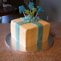 Birthday Present This was the first attempt at a birthday present cake. Decided to use SMBC instead of covering in fondant and next time I think I would...