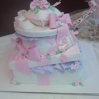 Grace yellow cake with chocolate ganache filling,buttercream and fondant.box lids are foamboard cover with fondant.