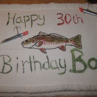 Red Drum Fish chocolate cake with white buttercream icing red drum fish painted on icing
