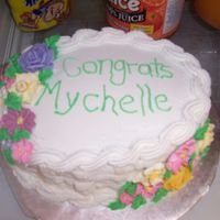 A Last Minute Cake marble with fudge cake with hot fudge sundae mix with buttercream for filling and buttercream and royal icing flowers