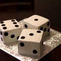 Dice They are each 3 6" square cakes that I trimmed after stacking. Butter Pecan cake with BC filling. Getting the square was impossible!