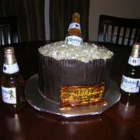Beer Bucket Chocolate buttercream, fondant, sugar ice/bottle. 2 other bottles are real.