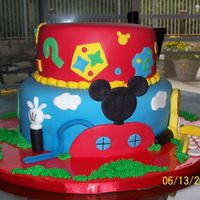 Mouse Club This was a cake we made for a childs birthday, the theme was Mickey Mouse Club. All decorations are made from fondant.