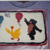 Little Bear My daughter loved the show Little Bear, and asked for a cake with him on it.