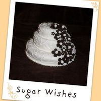 Mini Cake 6" 4" & 3" Mini vanilla cake with buttercream, covered in fondant., buttercream scroll design. Chocolate fondant flowers...