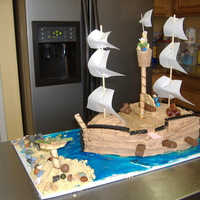 Pirate Ship My practice cake for my Daughters birthday, cake (forgot to take one of the actual cake at her party :( BC and various candies to decorate...