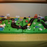 Road Of Life Birthday cake for my Dads 80th. Decorated with things from throughout his life from childhood to now. Thanks for the great ideas from other...