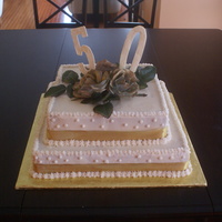 50Th Wedding Anniversary Cake Buttercream icing and the numbers are my first attempt at using color flow.