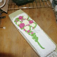 "bouqet Of Flowers" Cake This is a sheet cake cut down, filled with strawberry icing and strawberry filling. The "placard" is fondant written on with an...