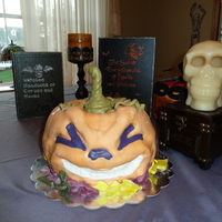 Scary Pumpkin Pumpkin cake/ Cinnamon Cream Cheese Icing covered in fondant. All hand carved muah hahahahahaha ! TFL