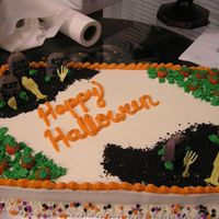 Happy Halloween I did this cake for a friend at work. It is a white almond sheet cake. Half of it is filled with strawberry and the other half is filled...