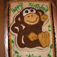Monkey Birthday Cake I made this for my niece who was having a monkey-themed birthday party. The sheet cake is a butter golden cake mix with bavarian cream for...
