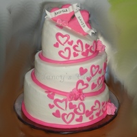 Pink Hearts My first attempt at a Topsy-Turvy cake. Didn't turn out quite as "turvy" as I would have liked. Buttercream with fondant...