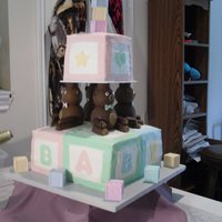 Baby Shower yellow cake w/ sour cream, buttercream icing and fondant accents.