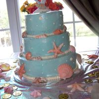 1St Wedding Cake german chocolate (from scratch) w/ coconut pecan filling; swiss meringue buttercream; handmade seashells.