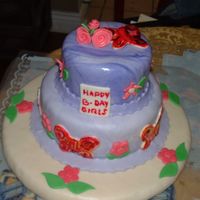 Dscf0013_86.jpg First tiered cake and 5th decorated cake, please let me know what u think.