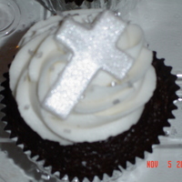 Baptism Cupcake Triple chocolate cake, peanut butter buttercream filling, vanilla buttercream frosting, silver chunky sugar sprinkles, fondant cross with...