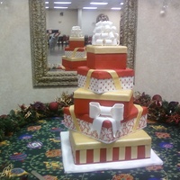 Christmas Wedding 5 Tier Christmas Presents wedding cake. My first attempt at box tops but the bride was very happy anyways.