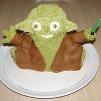 Yoda This was a Yoda cake for my nephew's birthday I used the 3D bear pan and just made ears out of fondant and plastic tubes for the arms...