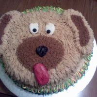 Puppy This was for a friend who loves dogs, I used the animal crackers pan from Wilton and just freehanded the details, the ears are BC covered...