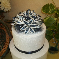 Cake Topper Navy blue stargazer lilies made from gumpaste.