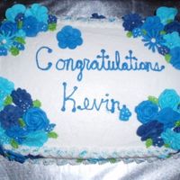 Graduation Cake--Blue Flowers This is a graduation cake I made for a co-worker. She said she wanted a plain sheet cake with flowers in all different shades of blue. I...