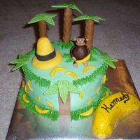 Curious George I made this cake for a little girl's first birthday! She loves Curious George so we went with that theme. It is a chocolate cake with...