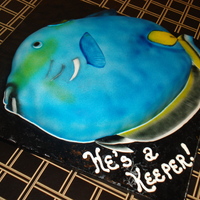 Here.... Fishy Fishy Fishy Groom loves his fish. Blue tang at the rehearsal dinner