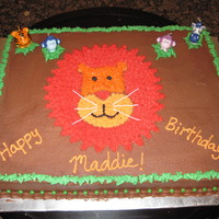 Safari Birthday Cake This is a yellow cake with chocolate buttercream frosting. It was for a little girl's second birthday. I did the lion freehand using...