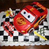 Lightning Mcqueen Cake This is my first attempt to make a carved cake. I think it turned out good. The flooring is yellow cake covered with mm fondant. Car is...