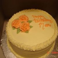 Blakemomcake.jpg red velvet cake, cream cheese icing. peach colored roses
