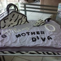 Mother Diva Made for a coworker's mom's birthday. Cream cheese frosting and fondant-covered purse and shoe.