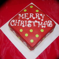 Family Christmas Cake buttercream with satin ice fondant accents