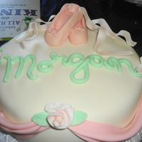 Ballet A cake for my little ballerina. Everything on there is fondant and gumpaste. I free formed the shoes.