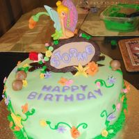 Tinkerbell All fondant accents. The tinkerbell was a cake topper- was too afraid to attempt that in fondant.